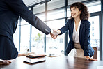 Business people, handshake and smile for b2b, interview or partnership in teamwork at the office. Happy female executive shaking hands with employee for meeting, greeting or introduction at workplace