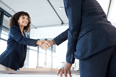 Buy stock photo Business people, handshake and smile for b2b, meeting or partnership in teamwork at the office. Happy female executive shaking hands with employee for interview, greeting or introduction at workplace