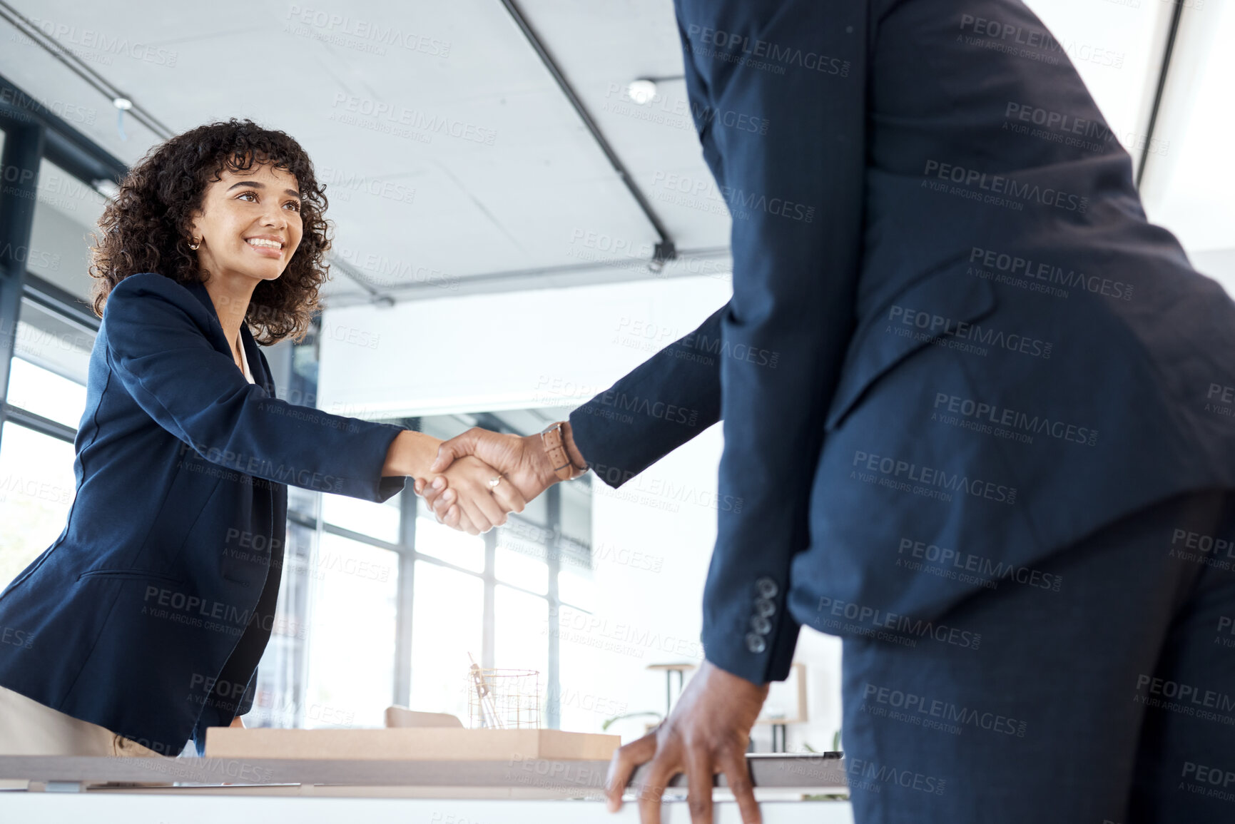 Buy stock photo Business people, handshake and smile for b2b, meeting or partnership in teamwork at the office. Happy female executive shaking hands with employee for interview, greeting or introduction at workplace