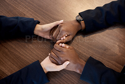 Buy stock photo Couple, above and hands of comfort in support of bad news, cancer or diagnosis above a table, unity and trust. Hand, holding empathy by woman with man for depression, prayer or kindness during crisis