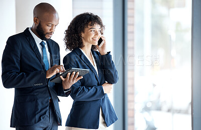 Buy stock photo Phone call, tablet and business people walking in the office together after a team meeting. Technology, career and man doing research on a digital device and woman on mobile conversation in workplace