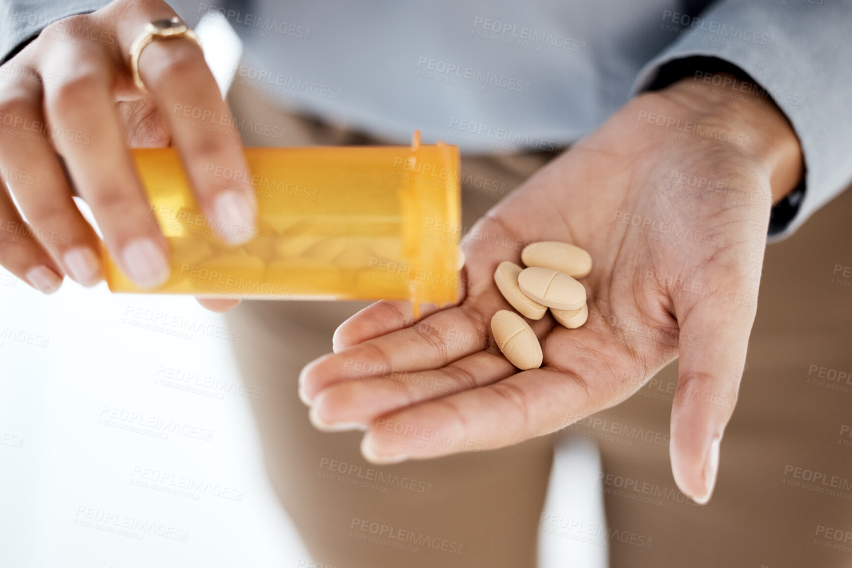 Buy stock photo Medicine, closeup and hands with pills for depression, cure and anxiety with pain and stress. Medical, healthcare and zoom with orange container, prescription and help for body care and mental health