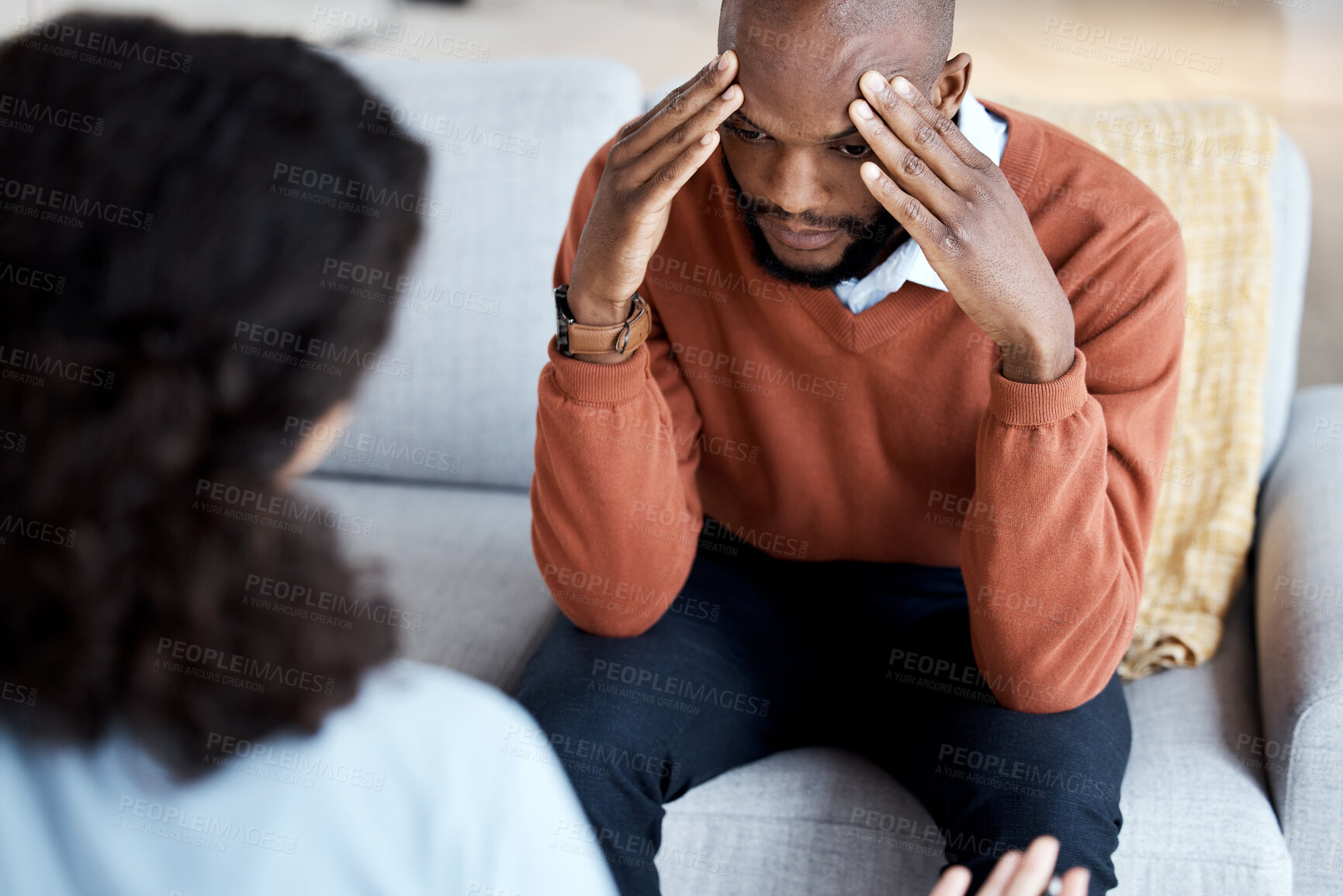 Buy stock photo Black man, mental health and headache with psychologist, stress and depression with help. Psychology consultation, woman doctor with patient and conversation about anxiety problem, sad and depressed