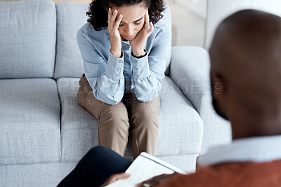 Buy stock photo Counselling, therapy and depression of black woman with mental health problem on psychologist couch. Patient person talking to therapist man about psychology, anxiety and trauma or stress for help
