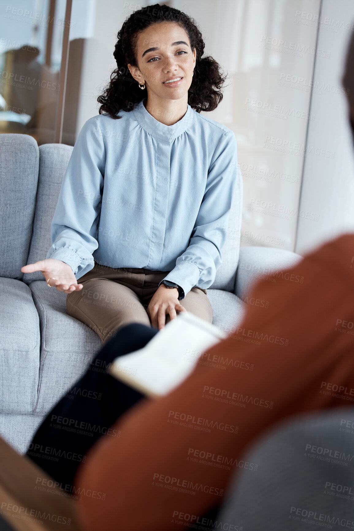 Buy stock photo Mental health, talking and black woman in therapy session, depression and discussion for stress, grief or loss. African American female, patient or lady with anxiety, conversation for help or anxious