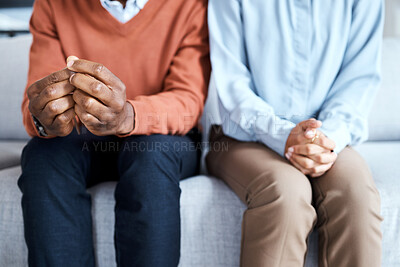 Buy stock photo Nervous, hands and couple in waiting room for results, cancer and bad news, diagnosis and stress. Hand, anxiety and man with woman on sofa for depression, marriage counseling or divorce discussion