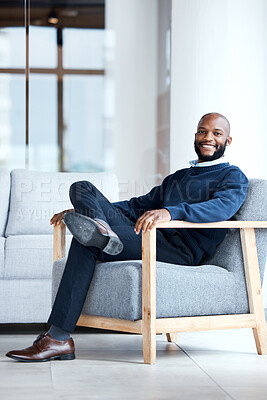Buy stock photo Portrait, black man in office and waiting on chair, smile and confident for job interview, resting and relax. Face, African American male employee and entrepreneur in workplace, happiness and joyful
