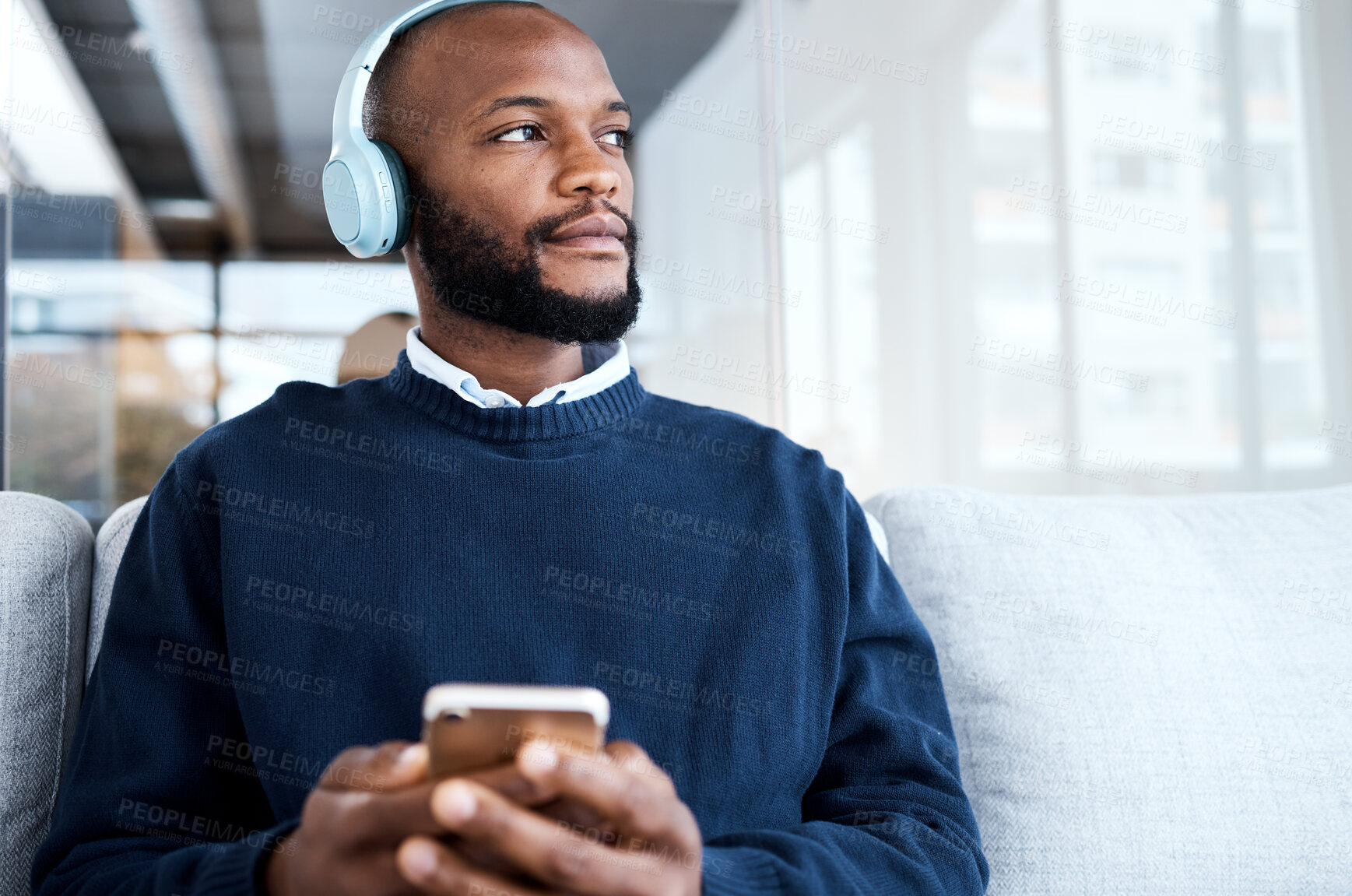 Buy stock photo Black man thinking with smartphone, headphones and music for calm and peace, vision and mindset with audio streaming. Online, listening to radio or podcast for motivation, social media and mockup