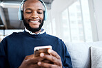 Black man with smartphone, headphones and face, music and smile, scroll social media and audio streaming. Online, listening to radio or podcast with happiness and relax with texting or email