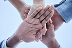 People, trust and hands together below for community, unity or team agreement in support for collaboration. Hand of group in teamwork, motivation or coordination for win or partnership in solidarity