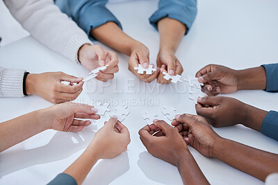 Buy stock photo Business people, hands and puzzle in team building for planning, strategy or collaboration above on table. Hand of group in teamwork solution or support for project management and cooperation at work