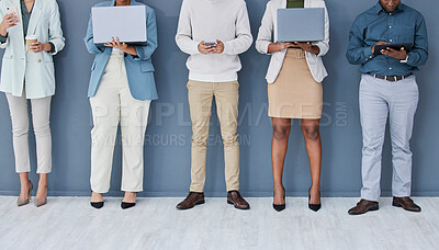 Buy stock photo Business people, waiting or technology in job interview row, recruitment line or hr wall queue. Diversity, men or women legs in human resources, hiring or onboarding office on phone, laptop or tablet