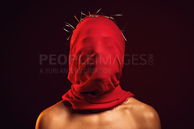 Buy stock photo Red fabric, creative aesthetic and religion in a studio with a face covering model for luxury clothing. Glamour, religious crown of thorns and a woman with god respect wearing vintage or silk apparel
