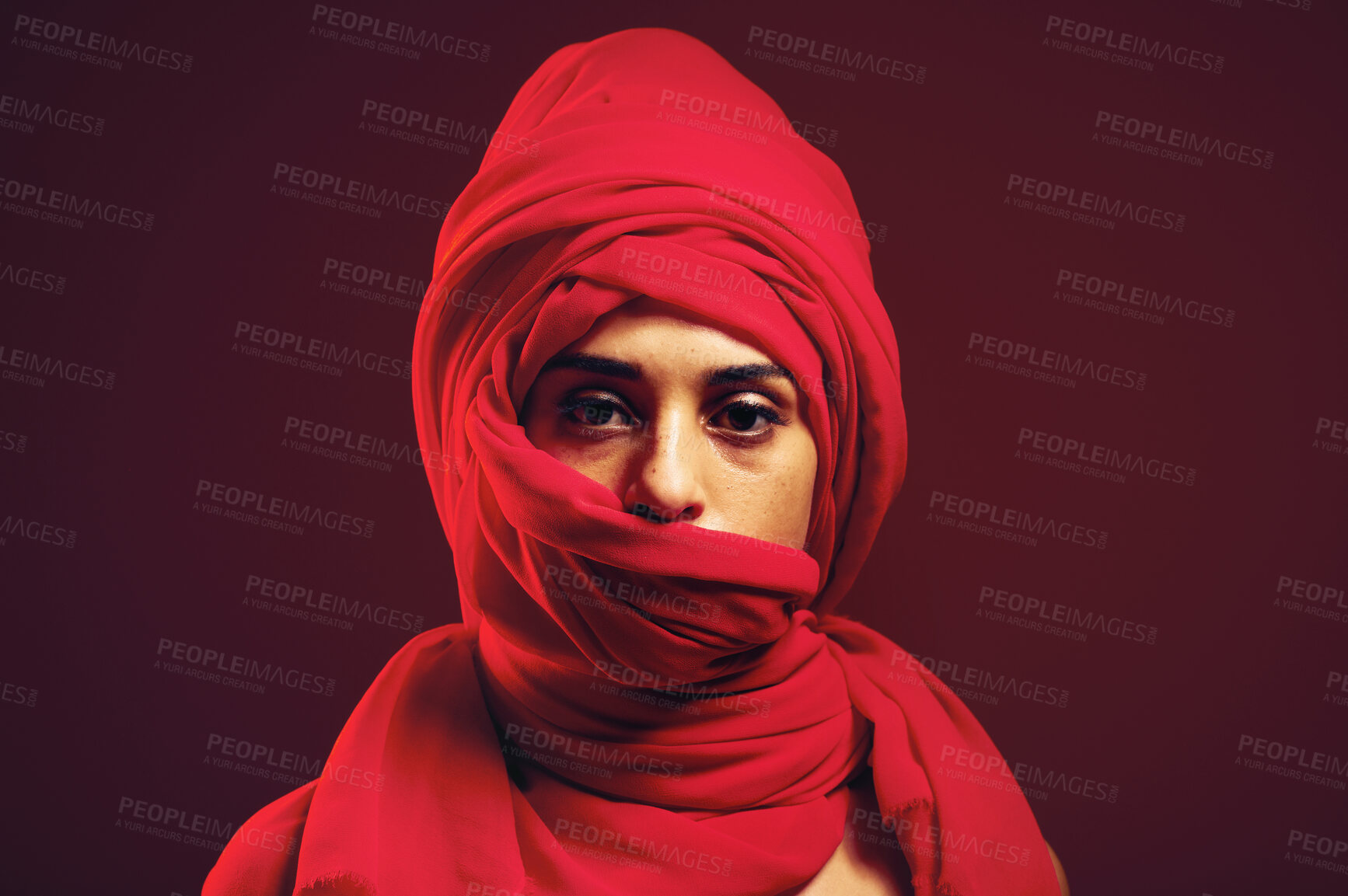 Buy stock photo Hijab, muslim and portrait of a islamic woman in studio with dark background. Serious, covered and red arab head dress with a young person with religious, culture and islam fashion scarf with mockup