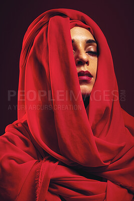 Buy stock photo Muslim, makeup and woman in studio with hijab, mockup and advertising beauty on black background. Islamic, face and Arab girl model relax in mysterious, aesthetic and confidence while isolated