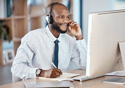 Buy stock photo Call center, customer service and man consultant writing notes while doing a consultation online. Contact us, operator and African male telemarketing agent on computer planning crm strategy in office