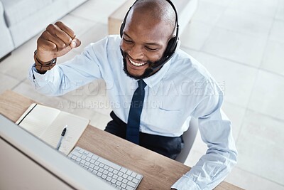 Customer service computer, consulting celebration or happy man telemarketing on contact us CRM or African telecom. Call center fist pump, online ecommerce or excited information technology consultant