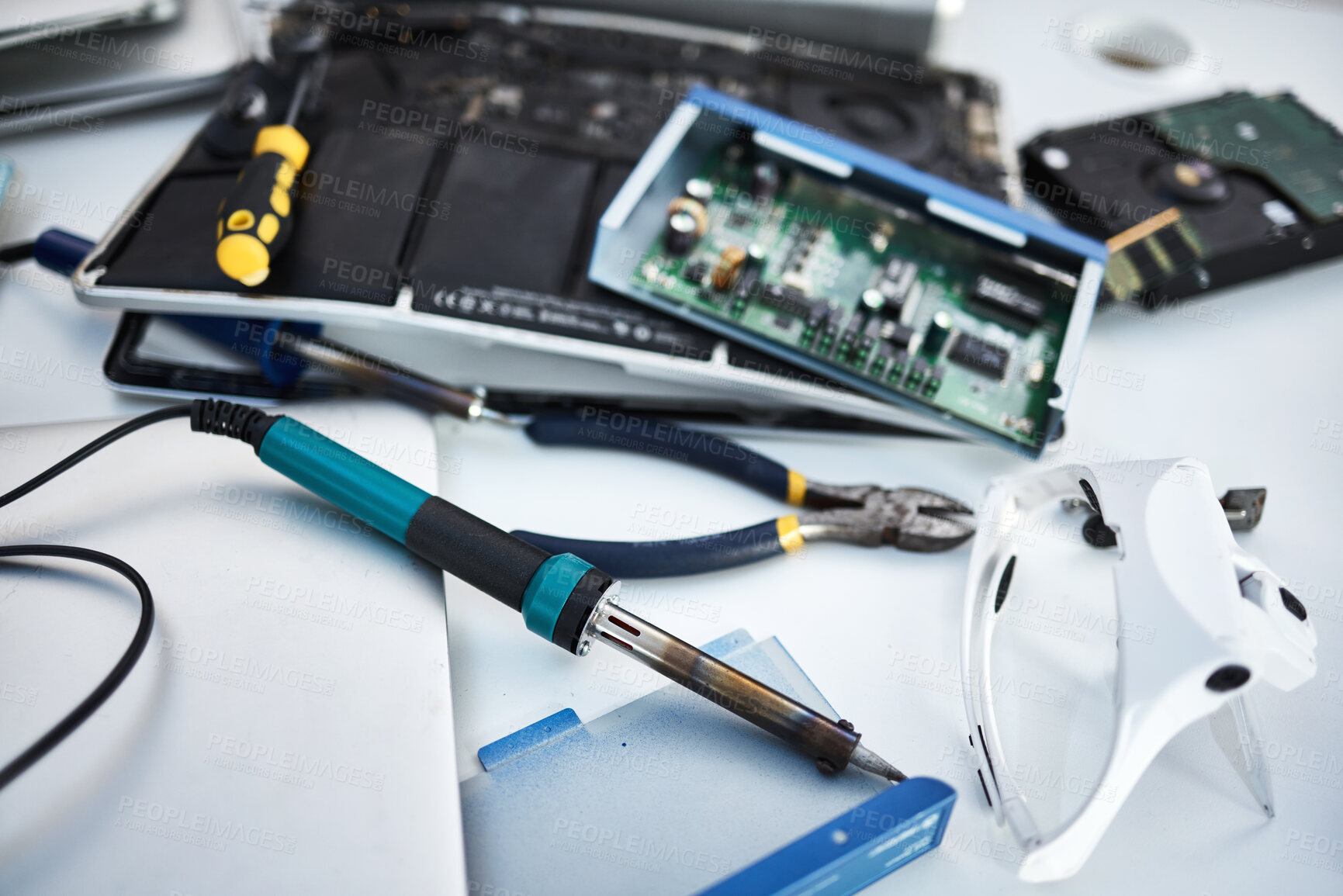 Buy stock photo Tools, computer hardware and equipment in the office for tech repairs, maintenance or upgrade. Database, technology and supplies for electric board servers on a desk in the it industry workplace.