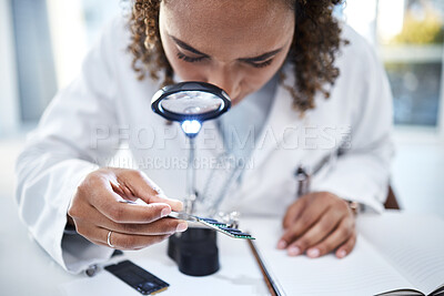 Buy stock photo Hand, microchip and magnifying glass with an engineer woman at work in a laboratory for research or innovation. Science, computer chip or zoom with a female scientist in a lab to develop electronics 