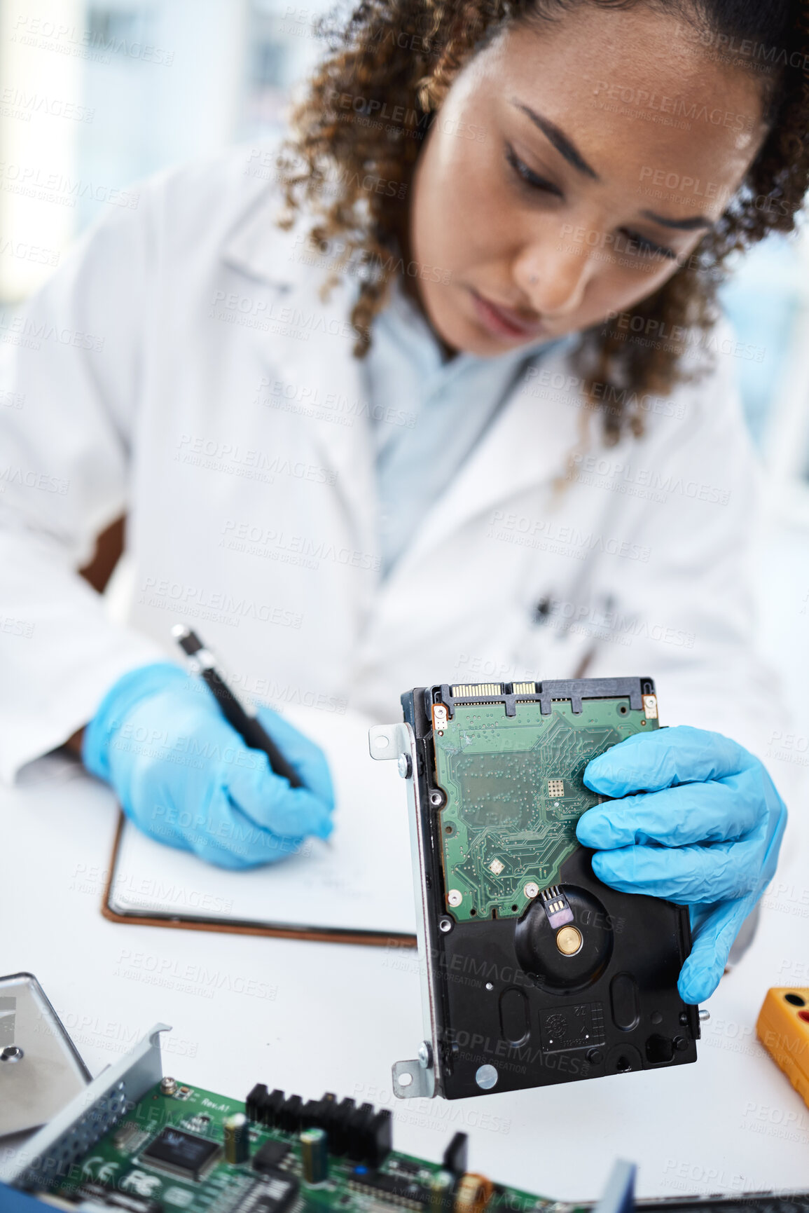 Buy stock photo Black woman technician, computer or laptop motherboard for cyber crime investigation, analysis and IT solution. Information technology engineer, notebook and lab with hard drive, writing and notes