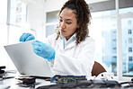 Black woman, computer motherboard or system for technician in cyber crime investigation at laboratory. Information technology engineer, laptop or lab for programmer with data analysis for IT solution