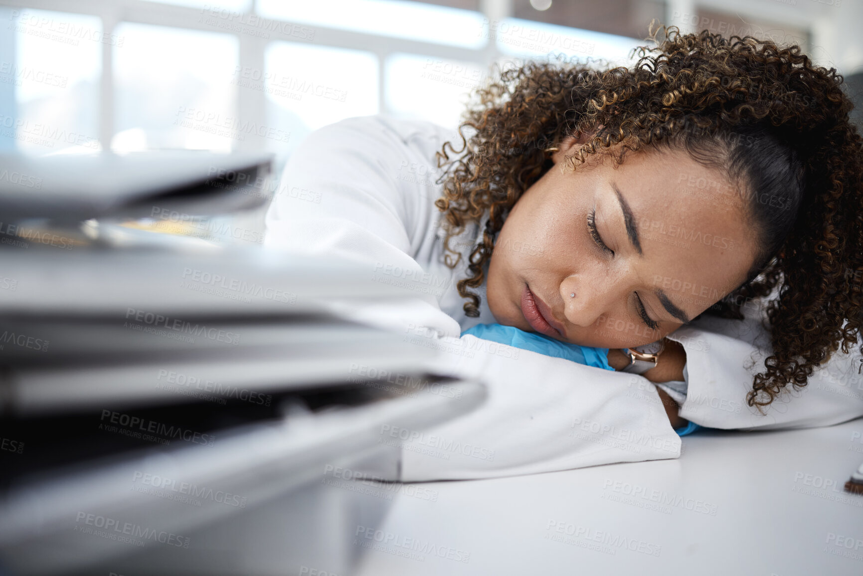 Buy stock photo Science, tired and scientist sleeping in lab after working on innovation experiment, test or research. Exhausted, burnout and professional female scientific employee taking nap on desk in laboratory.
