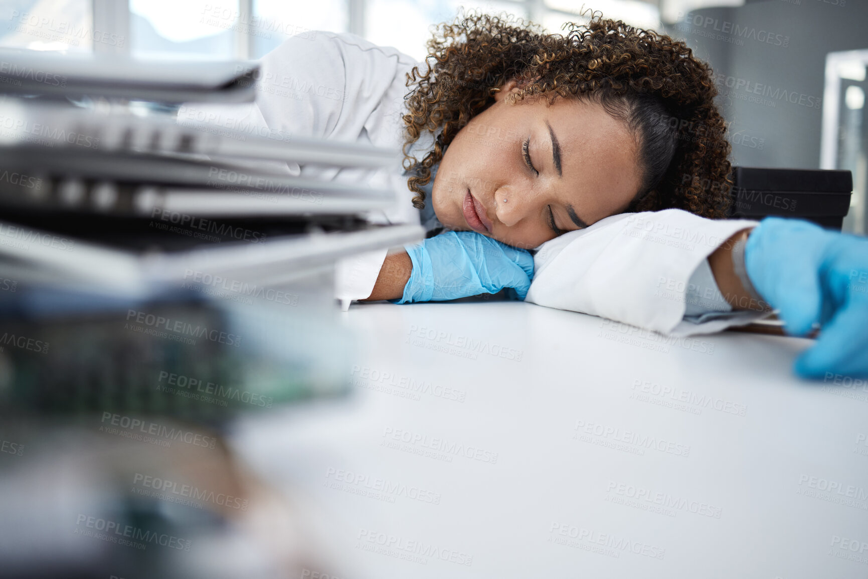 Buy stock photo Science, exhausted and scientist taking nap in lab after working on innovation experiment, test or research. Tired, burnout and professional female scientific employee sleeping on desk in laboratory.