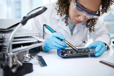 Buy stock photo Programming, hardware repair and black woman electrician working on cpu, circuit and microchip. Technology maintenance, soldering iron and female technician fix coding, motherboard and processor
