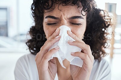 Buy stock photo Black woman, tissue and nose with flu in home with self care, health and sneeze by blurred background. Gen z girl, toilet paper and sick with allergy, covid and closeup in house, apartment or room