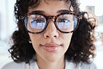 Portrait, therapist and face of woman with glasses, spectacles or eyewear feeling calm and focused. Head, vision and closeup of employee or worker looking serious with eyesight in an office