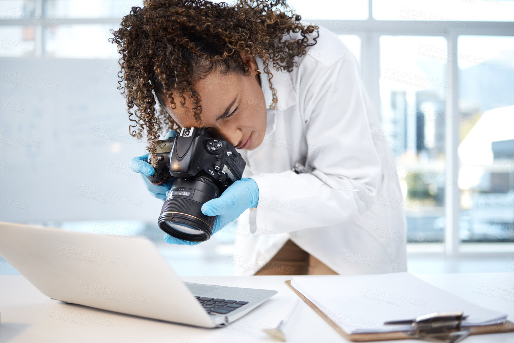 Buy stock photo Medical investigation, camera and black woman with laptop in laboratory for forensic research with evidence. Photography, science and girl take picture for crime analysis, analytics and observation