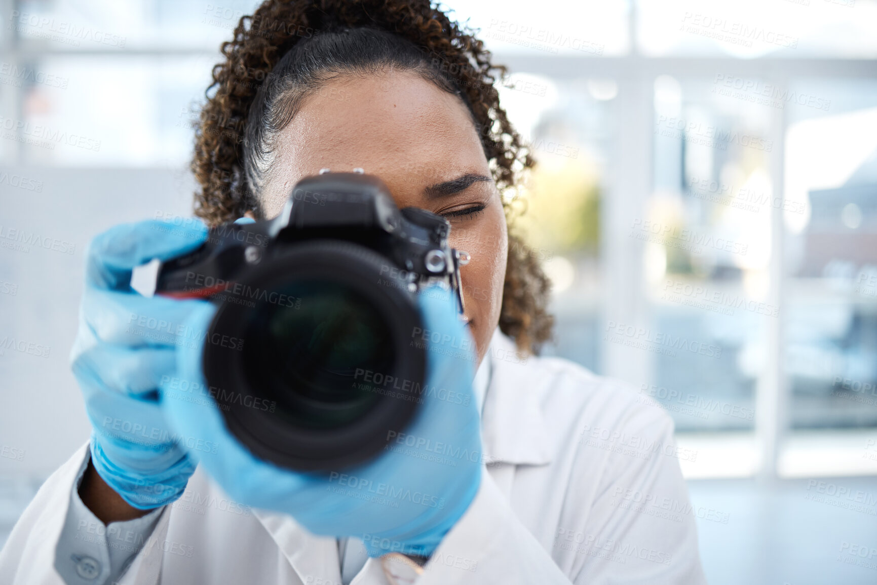 Buy stock photo Camera, medical and forensics with black woman in laboratory for investigation, crime scene and photography evidence. Research, analytics and observation with girl and digital pictures for science