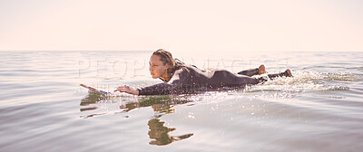 Surfer, woman and swimming in waves, sea and ocean for summer adventure, freedom and sky mockup. Female surfing on board in water, beach and relax for tropical holiday, nature travel and peace sports