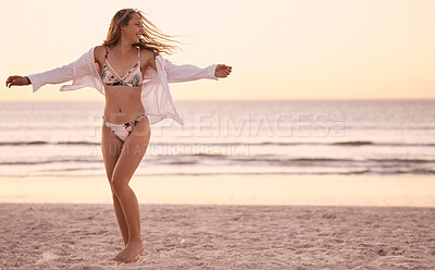 Buy stock photo Freedom, sunset and woman at the beach for swimming, energy and happiness at the ocean in Bali. Smile, relax and girl in a bikini at the sea for a holiday, stress free and enjoyment with mockup