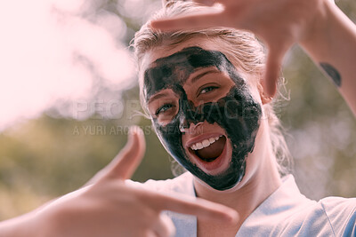 Buy stock photo Face mask, finger frame and portrait of a woman with a self care, natural and beauty morning routine. Happy, smile and female with a picture hand gesture doing a charcoal skincare facial treatment.