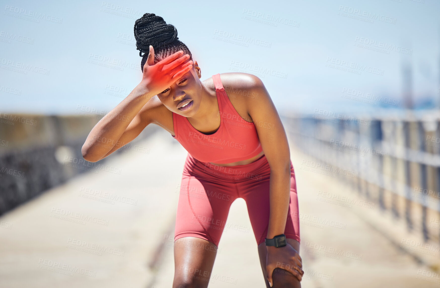 Buy stock photo Headache, fever and black woman runner by the sea with fitness, training and running injury. Head pain, sports and athlete with joint, muscle and inflammation problem with blurred background