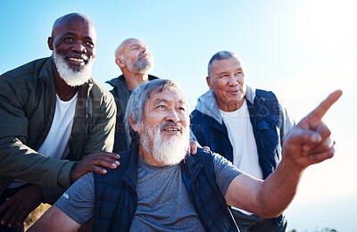 Buy stock photo Senior hiking, blue sky and nature walk of elderly men together in retirement pointing. Friends, trekking adventure and happiness of old people outdoor for health, wellness and fitness on a journey