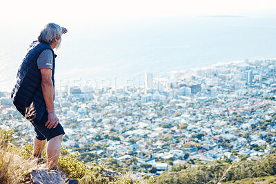 Buy stock photo Hiking, looking and senior man explore a city view for on an adventure, workout and fitness in Cape Town. Training, exercise and elderly person search on a mountain for health and wellness
