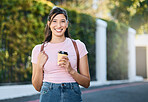 Travel, coffee and happy woman portrait by a city building with freedom on a urban in summer. Relax, smile and morning drink of a young person on vacation with happiness and backpack outdoor