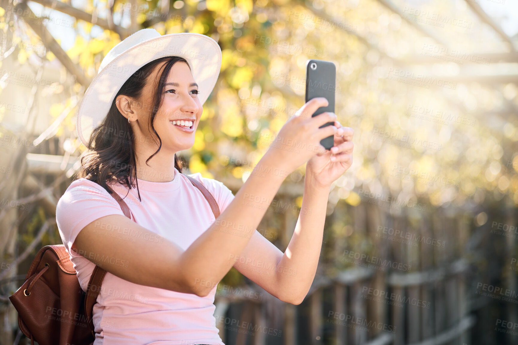 Buy stock photo Phone, nature and woman taking a picture while on an outdoor holiday or weekend trip. Travel, freedom and happy young lady with a smile taking a photo of view on cellphone while on adventure vacation