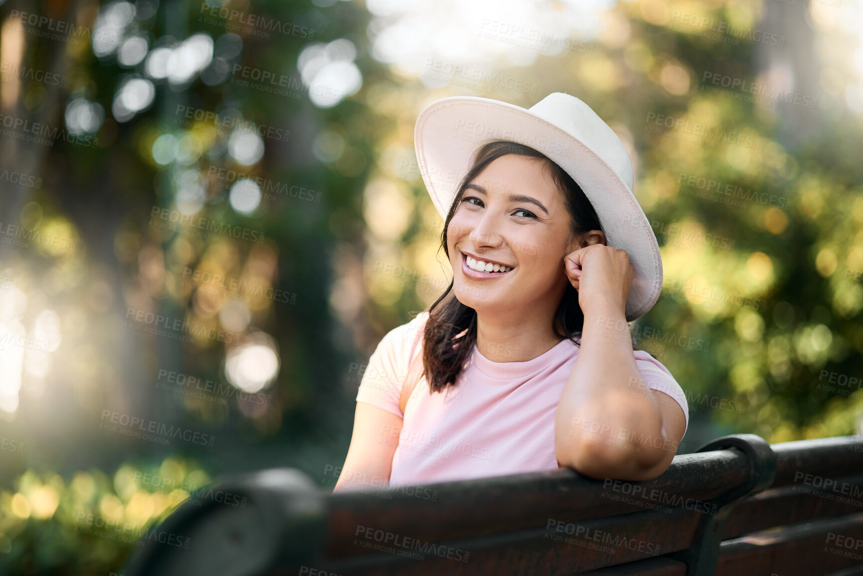 Buy stock photo Woman, park bench and portrait of a female with bokeh in a Japanese garden with a smile from travel. Freedom, happiness and face of a Asian person on holiday feeling happy on vacation with mockup