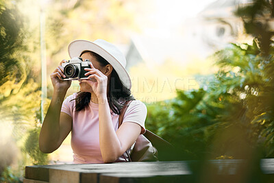 Buy stock photo Photography, memory and woman with a camera in nature during travel in Singapore. Vacation, tourism and professional ecology photographer in a botanical garden to capture the natural environment