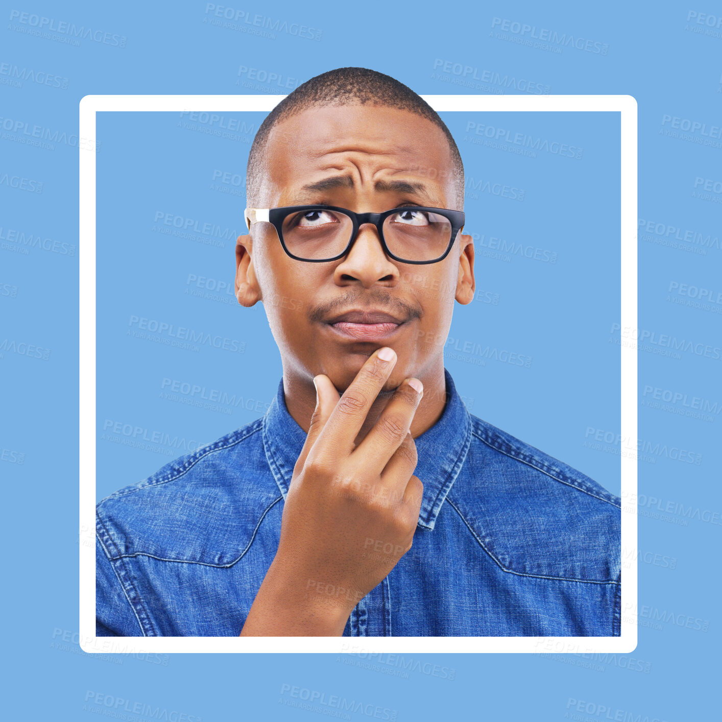 Buy stock photo Confused, thinking and black man in studio with frame, mockup and blue background space. Doubt, unsure and contemplation with a guy thoughtful in border, pensive or emoji collage while isolated