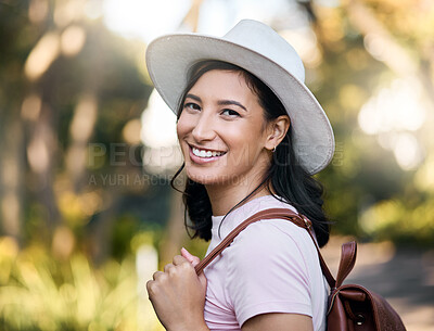 Buy stock photo Woman smile, portrait and park walk of a young person happy about nature, travel and freedom. Happiness, backpack and laughing female with blurred background in a garden feeling relax and summer fun