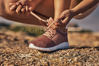 Buy stock photo Hands, fitness and tie shoes in nature to start running, workout or training. Sports, wellness and female or woman tying sneaker laces or footwear to get ready for exercising, cardio or jog outdoors.