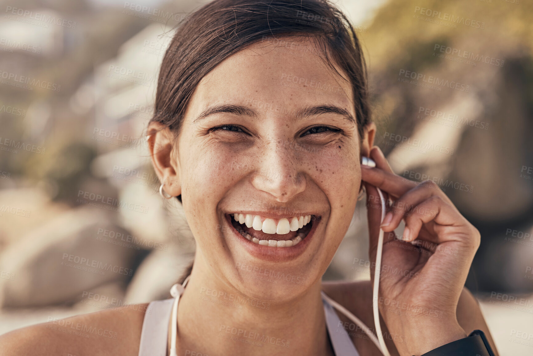 Buy stock photo Music, fitness and portrait of woman at the beach for running, training and cardio. Happy laugh, face and radio for girl in nature for exercise, wellness and motivation with funny podcast
