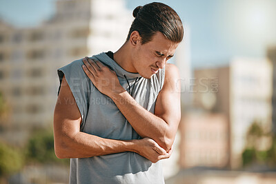 Buy stock photo Fitness, shoulder pain and man with injury after workout, exercise or training accident in city. Sports, health and male athlete with fibromyalgia, muscle inflammation or arthritis and broken bones.