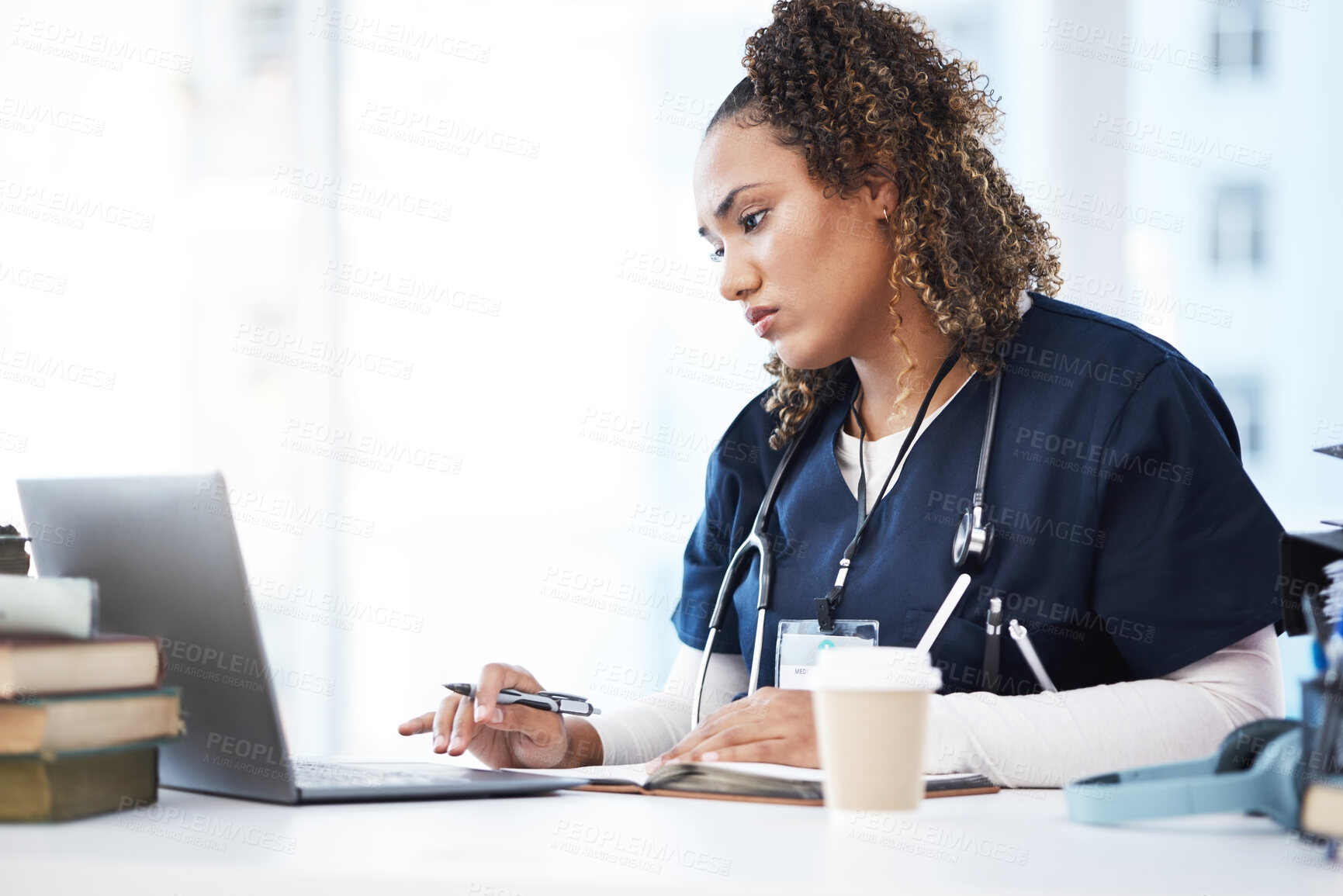 Buy stock photo Medical, laptop and research with a woman nurse reading information in a hospital for diagnosis. Healthcare, insurance and education with a female med student working in a clinic for data analysis