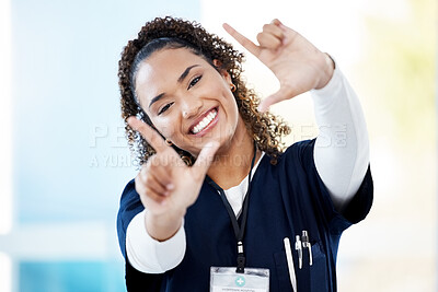 Buy stock photo Nurse, portrait or finger frame in hospital about us, medical trust or medicine empowerment on help mock up. Smile, happy or doctor in photography border, hands gesture or woman healthcare wellness