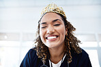 Portrait, crown and wink with a nurse in a hospital for healthcare having fun or feeling playful. Medical, winner and comic with a female medicine professional winking in a clinic for wellness